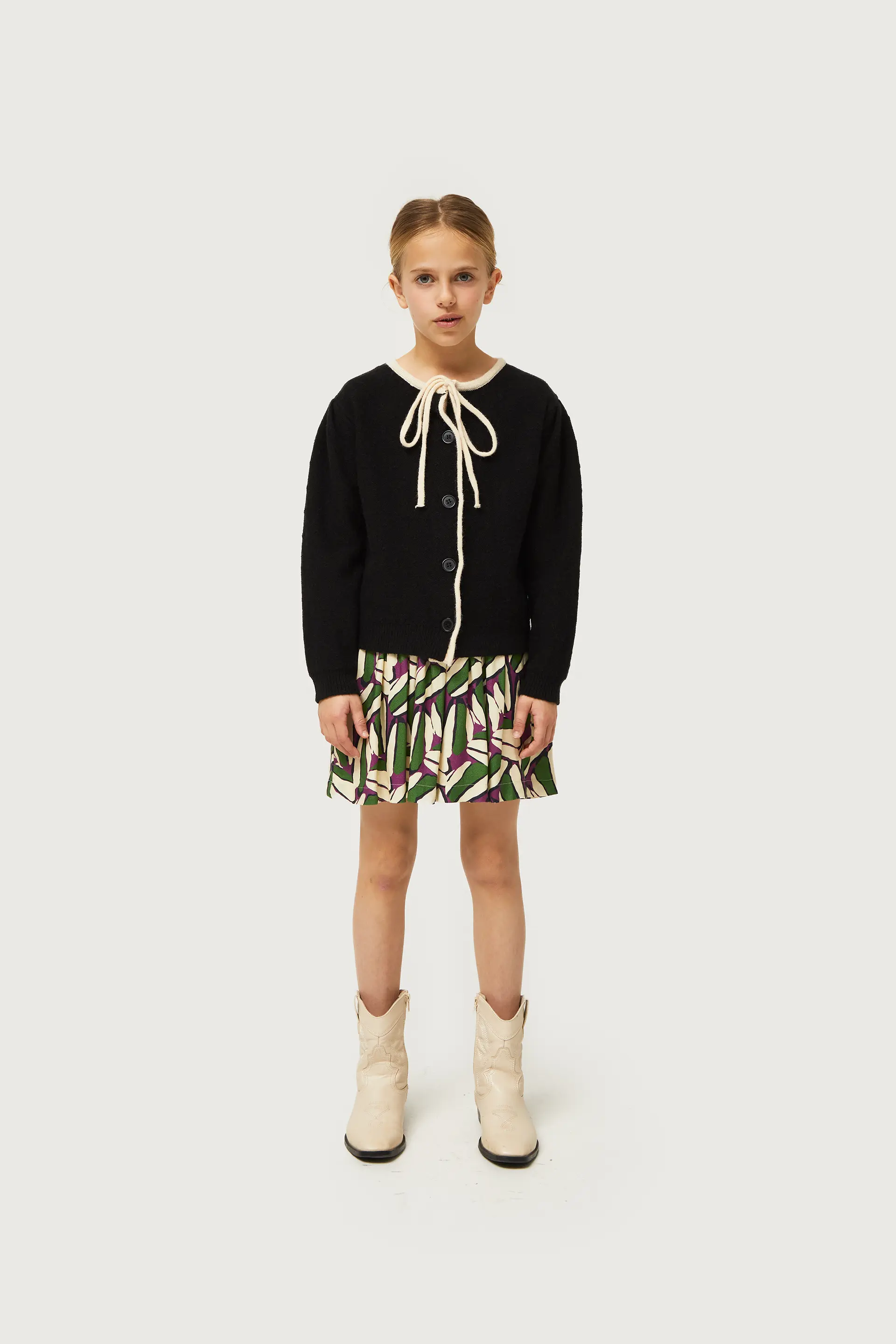 Cárdigan de niña con lazada negro