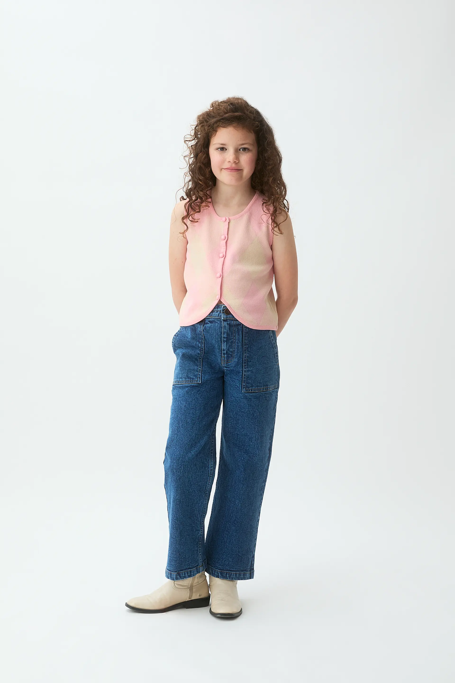 Chaleco de punto jacquard de niña con rombos rosas