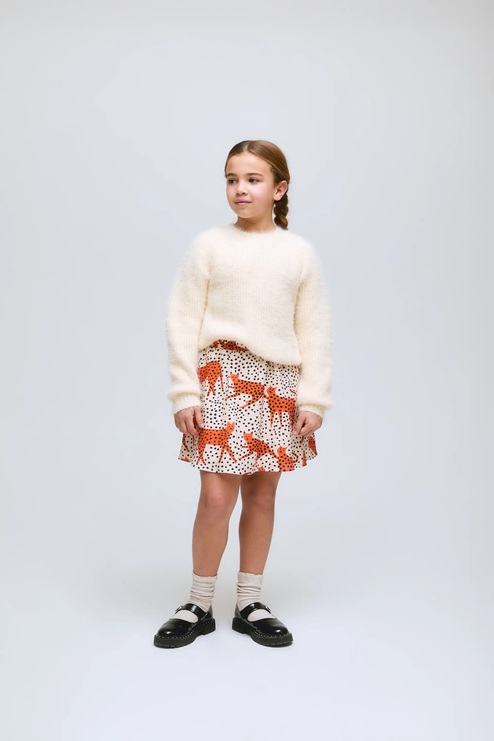 Falda corta de niña con estampado Tano