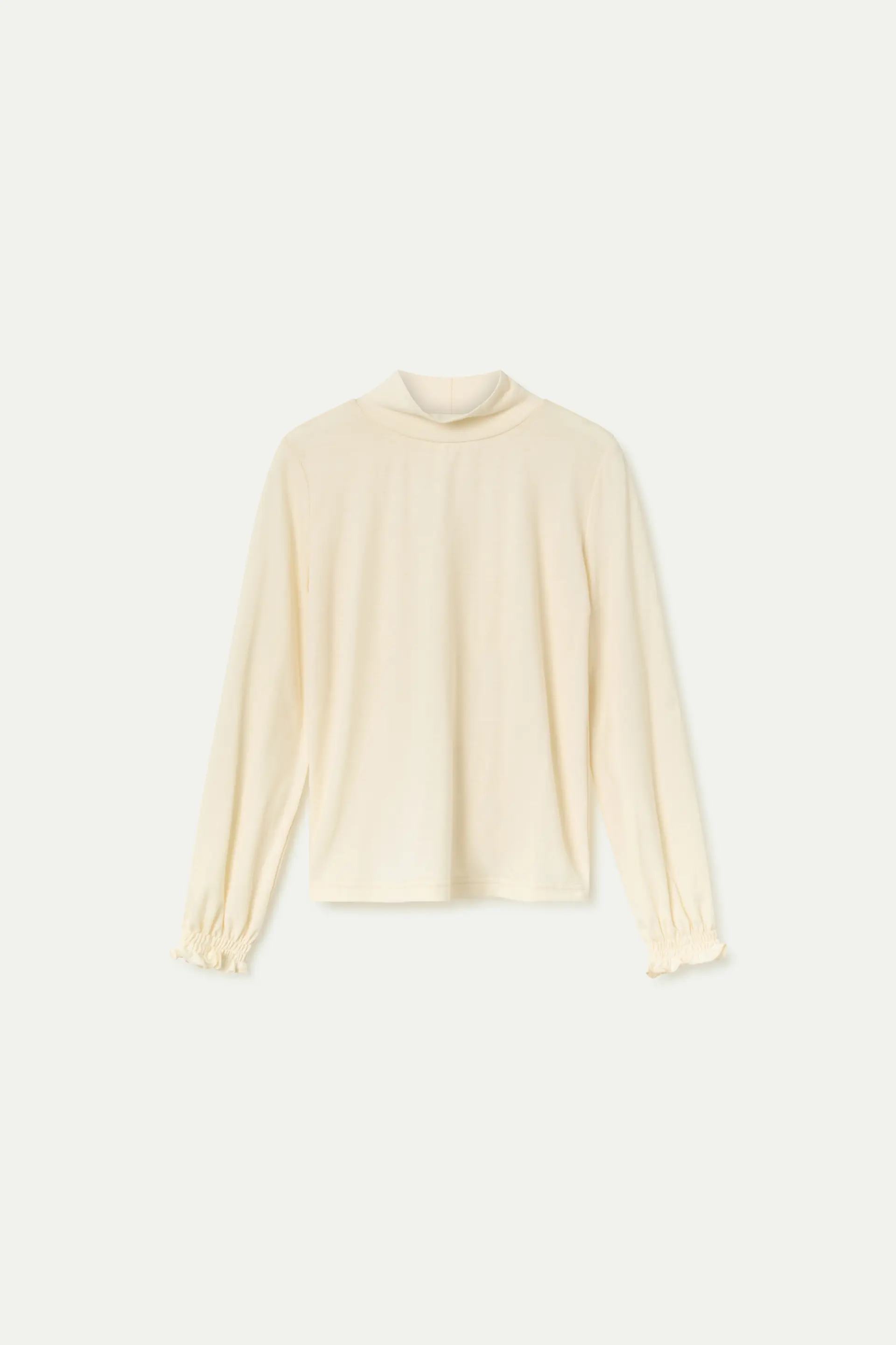 Jersey de niña blanco de cuello alto y puños fruncidos - Image 2