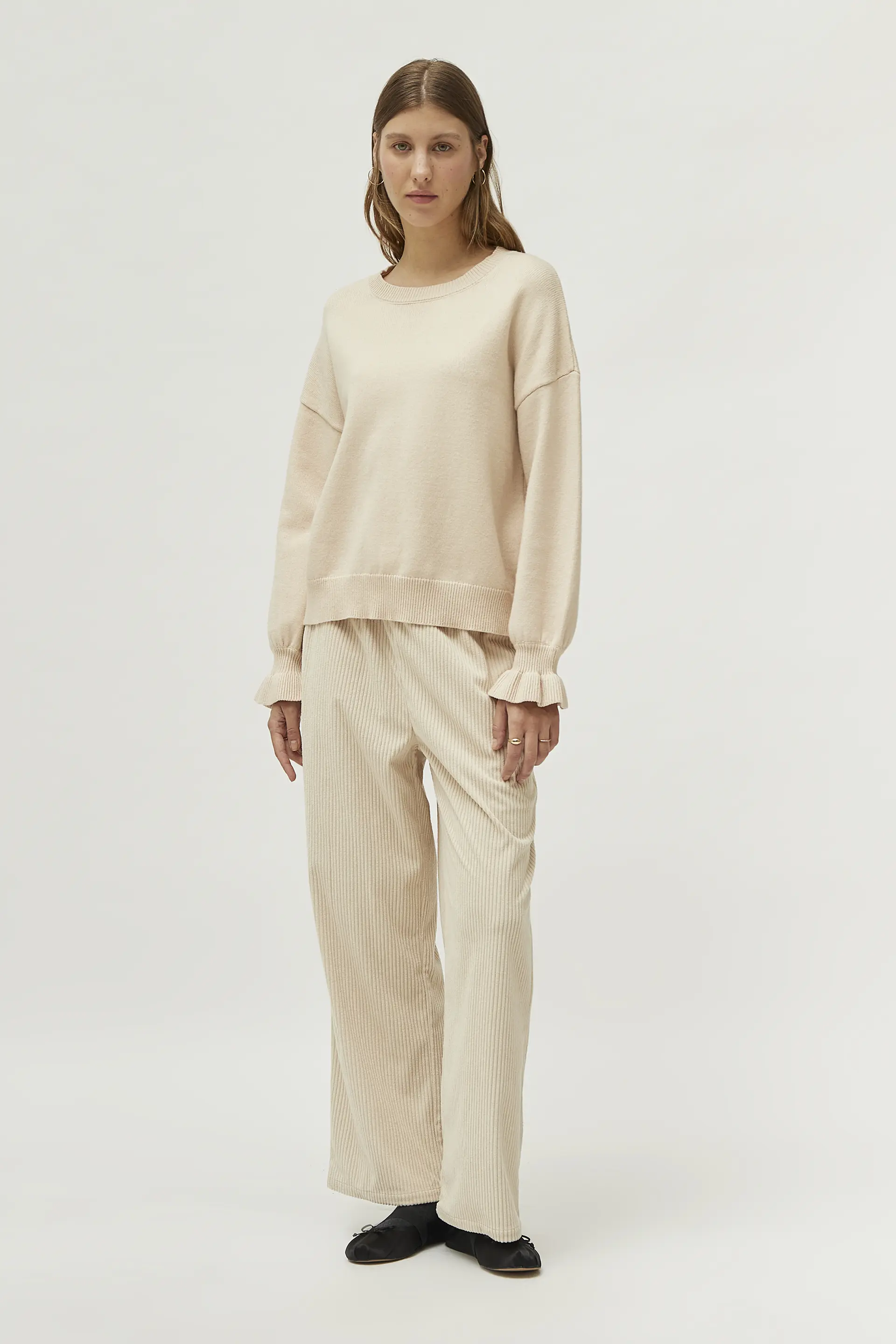 Jersey detalle puños beige