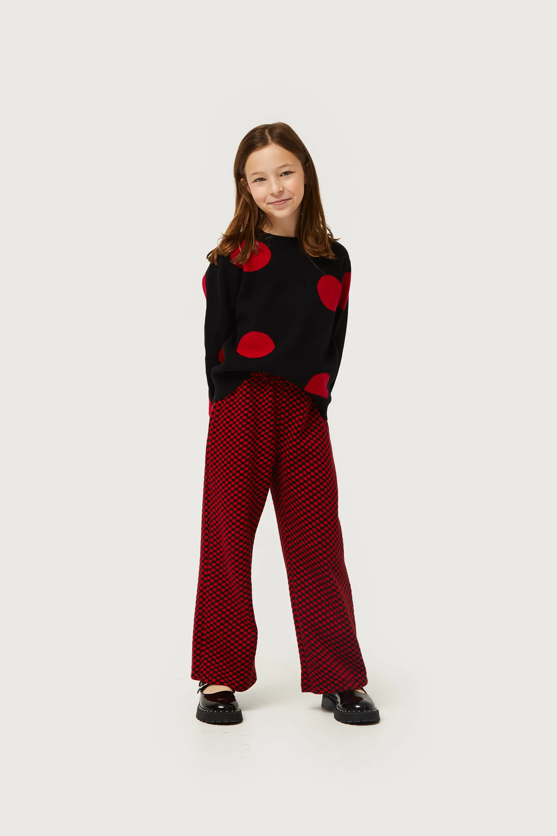 Jersey de niña de punto jacquard estampado de rojos