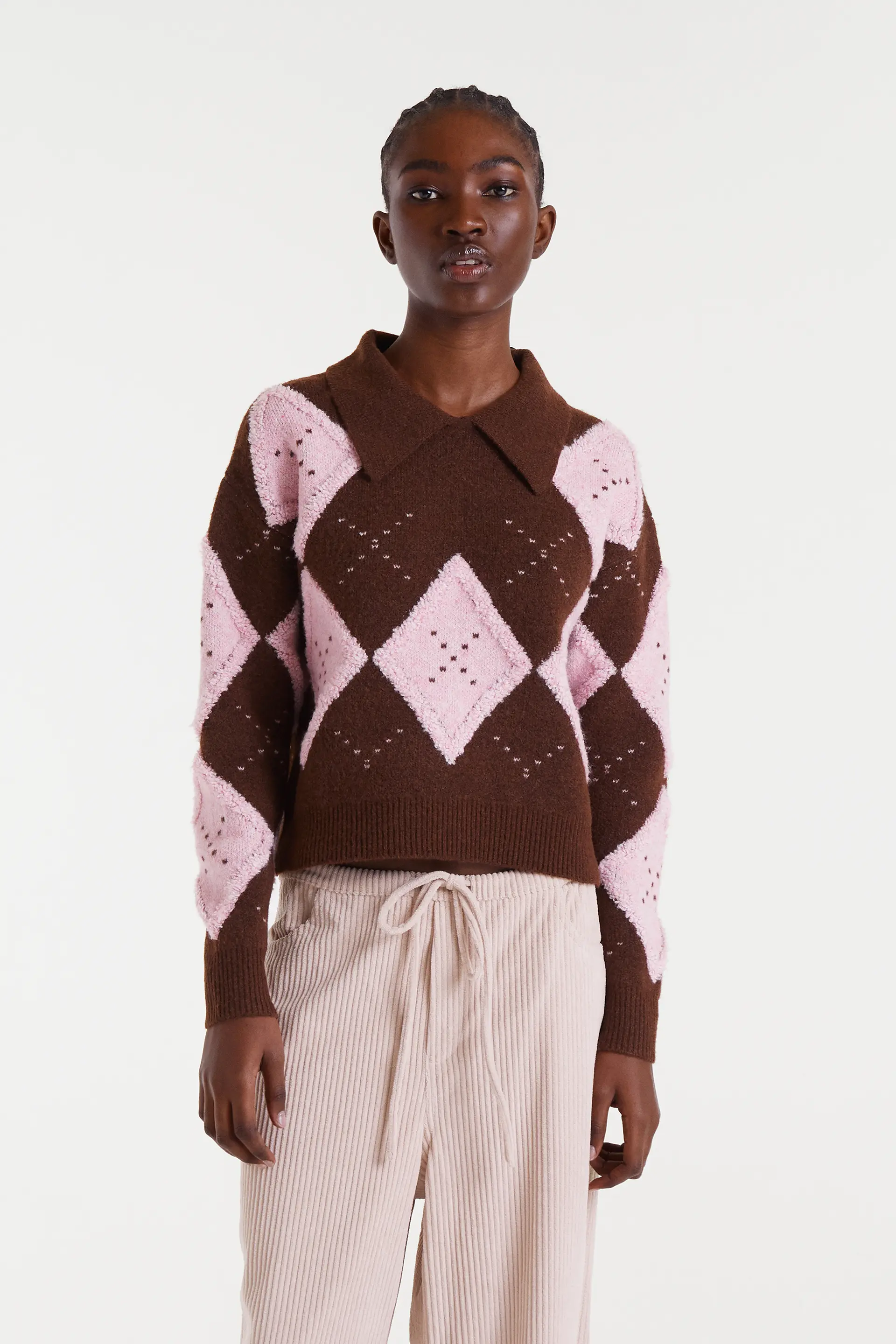 Jersey jacquard punto rombo rosado y marrón