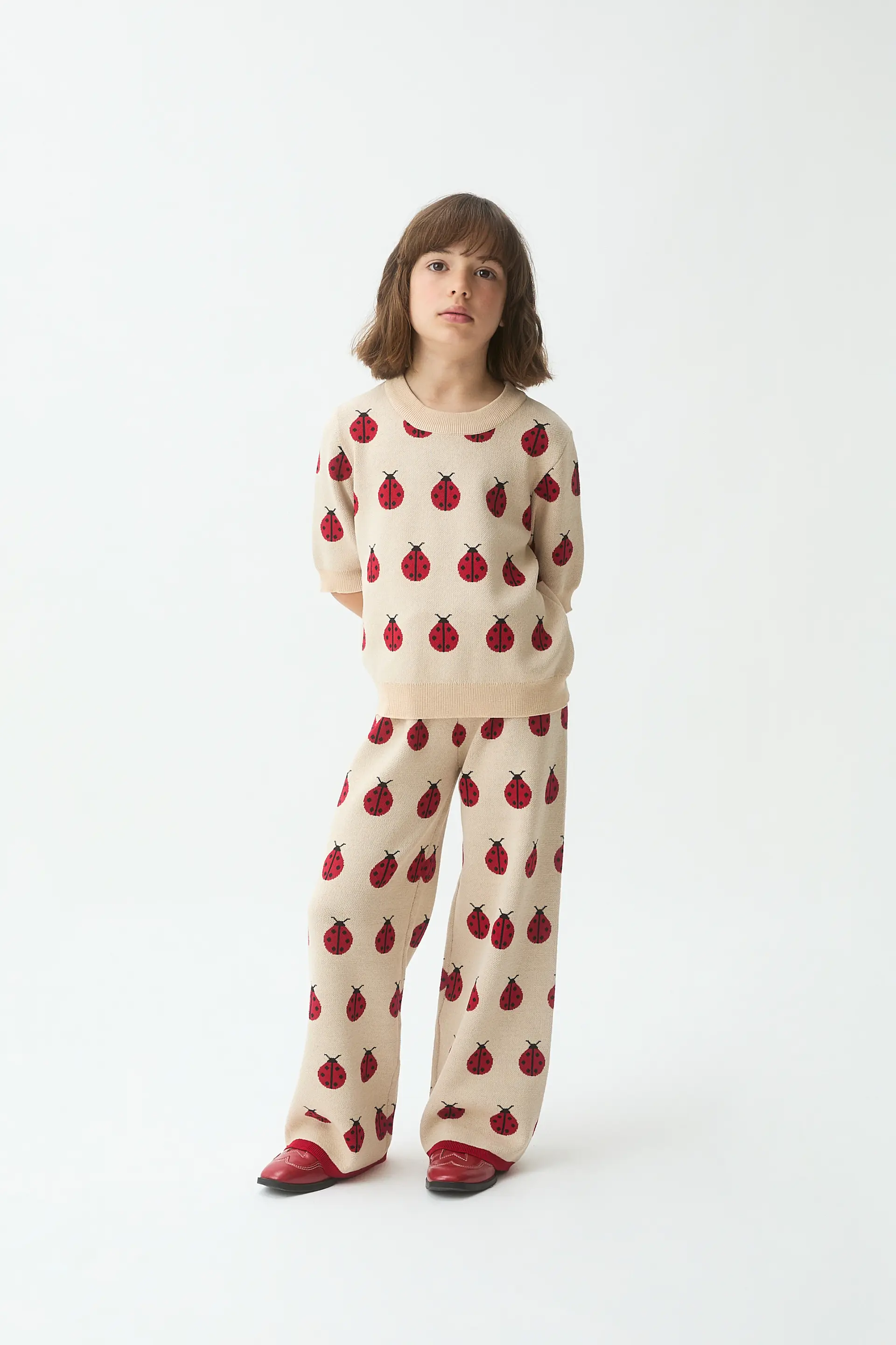 Pantalón punto jacquard de niña con estampado Red Coccinella